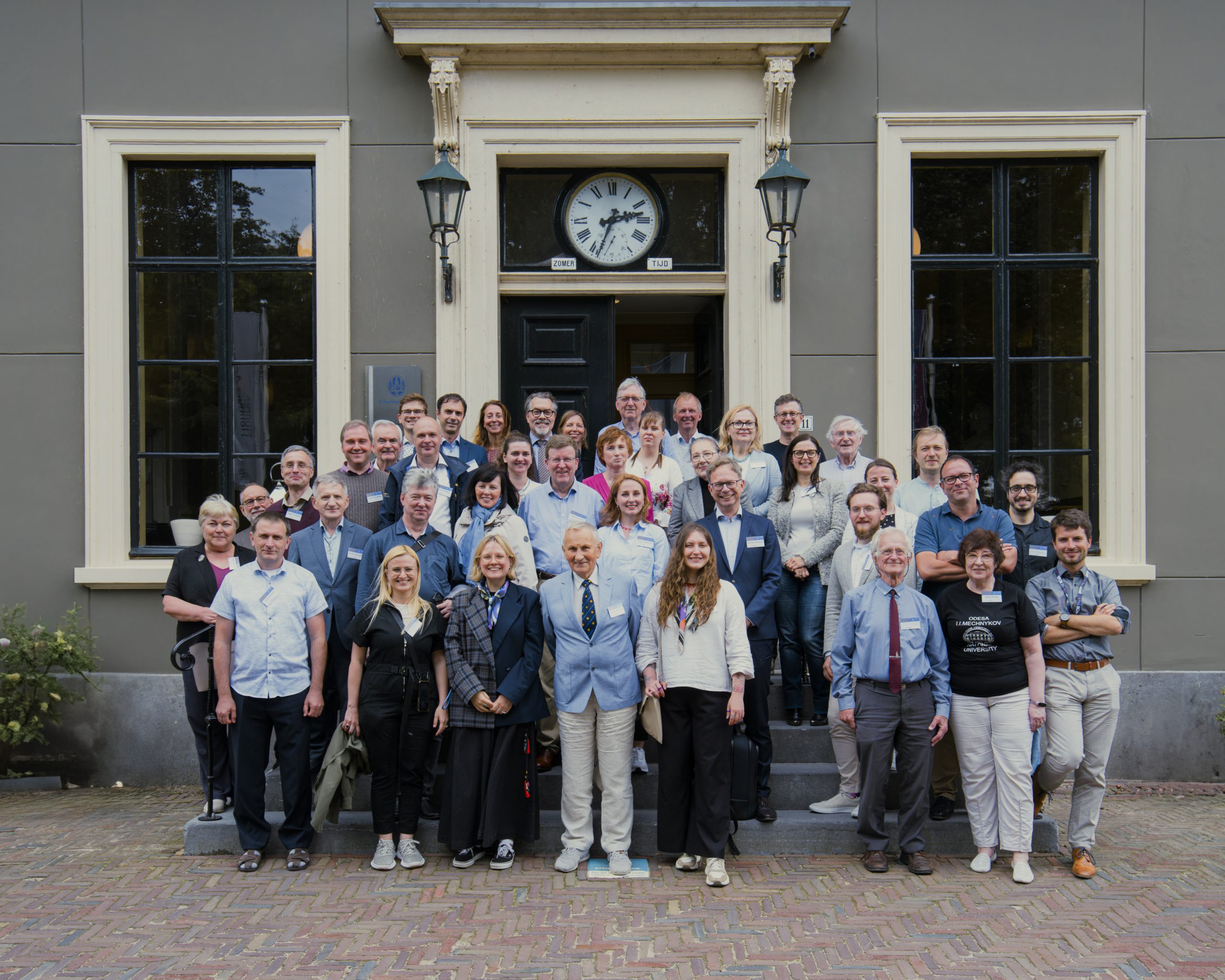 Participants of the Recovery Plan for Ukrainian Astronomy meeting on the steps of Leiden Observatory, June 2025.